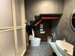 a bathroom with a toilet and a sink at Marina and Numazu sweet 1F - Vacation STAY 16710v in Numazu