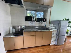 Kuchyň nebo kuchyňský kout v ubytování NAGO Sakura Resort Inn - Vacation STAY 14442v