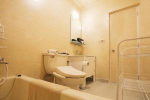 a bathroom with a toilet and a shower and a tub at House number 7106 - Vacation STAY 10493 in Furugen +36 photos