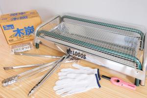 a cage with a pair of gloves and a box at Shakunagedaira Rental Cottage - Vacation STAY 18468v in Numajiri