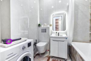 Koupelna v ubytování Шикарные апартаменты в Астане + 14 fotografií