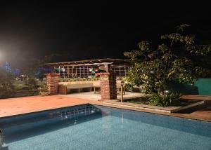 Foto sihtkohas Karjat asuva majutusasutuse Madhuson Palms galeriist +75 fotot