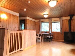 an empty room with a table and a stove at Trust Maison Atagawa 2 - Vacation STAY 24220v in Okawa
