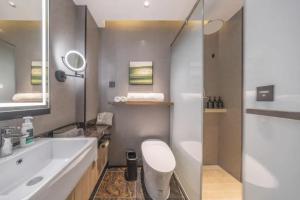 Ένα μπάνιο στο Atour X Hotel Nanjing Mochao Lake Shuiximen Street
