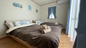 Postel nebo postele na pokoji v ubytování Hyakuna Beach Resort - Vacation STAY 19762v