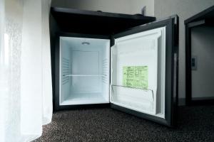 a refrigerator with its door open in a room at Rakuten STAY Kyoto Station Twin Room with ceiling projector in Kyoto