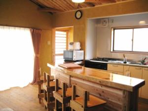 Кухня или мини-кухня в Log house for 12 people - Vacation STAY 35063v
