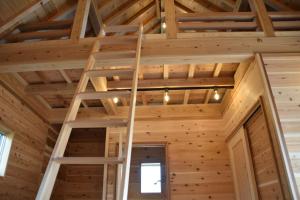 a ladder in the ceiling of a log cabin at Guest House Fukuchan - Vacation STAY 83847v in Kaiyo