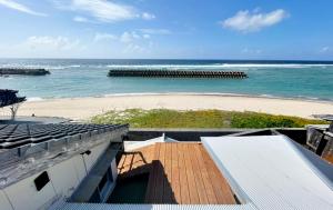a view of the beach from the roof of a building at Sani no Teitaku - Vacation STAY 36110v in Amami