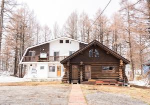 a log cabin in the woods in the snow at Chamonix - Vacation STAY 67793v in Iiyama
