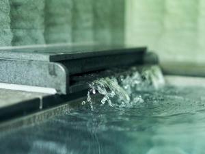 a close up of water coming out of a fountain at Rakuten STAY VILLA Hakone Sengokuhara North Wing 101 or 103 BBQ terrace Capacity of 10 persons in Hakone