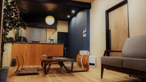 a living room with a couch and a table at Kawachi no Yado - Vacation STAY 41785v in Kawachinagano +39 photos