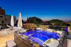 a hot tub on the roof of a house at Villa Albion in Rovinj