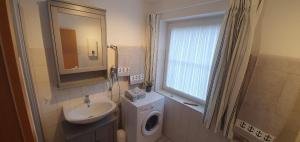 Koupelna v ubytování Kaept-n-Hook + 20 fotografií