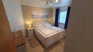 Postel nebo postele na pokoji v ubytování Kaept-n-Hook