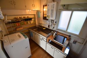Η κουζίνα ή μικρή κουζίνα στο Yadomachi sakura - Vacation STAY 54783v