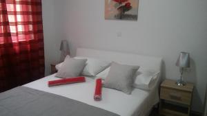 מיטה או מיטות בחדר ב-Apartment Vedran
