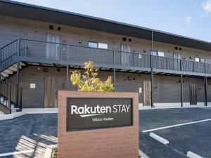 un edificio con un cartello davanti di Rakuten STAY Nikko Hoden Capacity of 4 persons a Nikko Altre 70 foto
