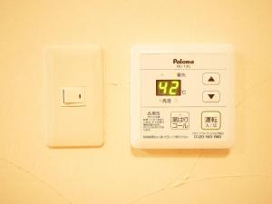 an electrical outlet with a clock on the wall at Mcity in Maejima - Vacation STAY 54881v in Naha +16 photos