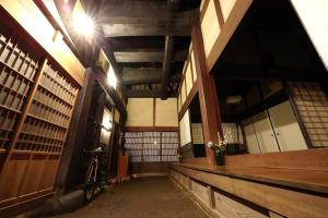 a hallway of a library with a bike parked in it at Hoshi no Yadori - Vacation STAY 89344v in Tombaramachi