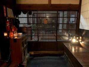 a room with a gate with lights on it at Hoshi no Yadori - Vacation STAY 89344v in Tombaramachi +1 photo