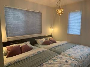 Ένα ή περισσότερα κρεβάτια σε δωμάτιο στο C - Vacation STAY 78498v +40 φωτογραφίες