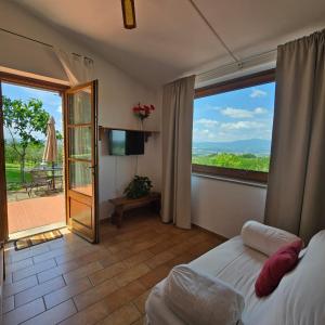 Voodi või voodid majutusasutuse Agriturismo Cornieto toas +75 fotot