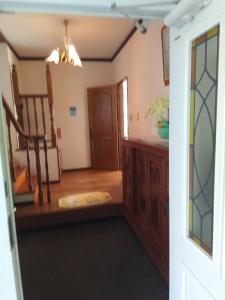 a living room with a table and a chair at Cafe panorama - Vacation STAY 96734v in Esumi
