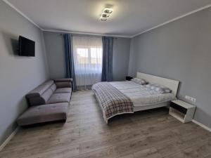 Postel nebo postele na pokoji v ubytování Casa Transilvania Tea