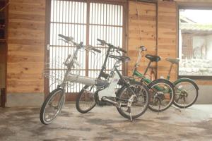 two bikes parked next to each other in a garage at Asobigokoro - Vacation STAY 03618v in Aso
