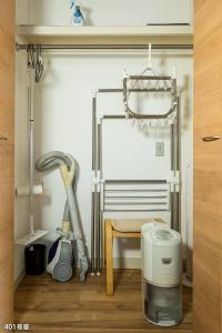 a room with a vacuum cleaner and a heater at Nanei Building - Vacation STAY 47375v in Kagoshima +45 photos