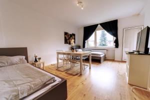 Postel nebo postele na pokoji v ubytování Workerslodge - Wohnung für 6 P in Krefeld