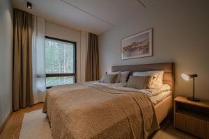 Giường trong phòng chung tại Levillas Levin Cranberry C26