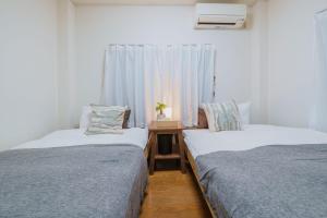 Postel nebo postele na pokoji v ubytování White Space - Vacation STAY 18162v
