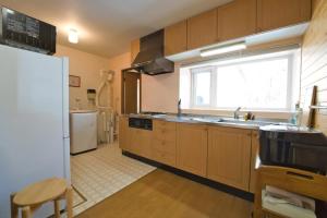 Kuchyň nebo kuchyňský kout v ubytování Shirokuma no yado - Vacation STAY 22791v