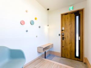 a room with a wooden door and a wooden drawer at Rakuten STAY VILLA Fuji Kawaguchiko Forest 2LDK with sauna and terrace-Pet Friendly- in Fujikawaguchiko +88 photos