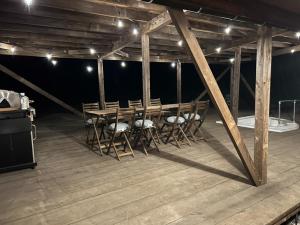a large room with a wooden table and chairs at Jyuuraku no mori - Vacation STAY 50432v in Awara