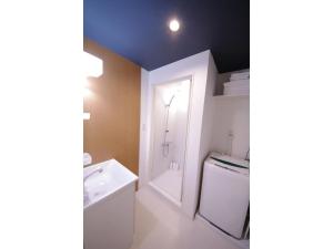 Ένα ή περισσότερα κρεβάτια σε δωμάτιο στο HOTEL APT SESELA - Vacation STAY 12880