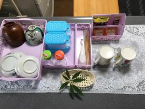 a toy set of kitchen items on a table at Family House "2F" - Vacation STAY 12940 in Kumamoto