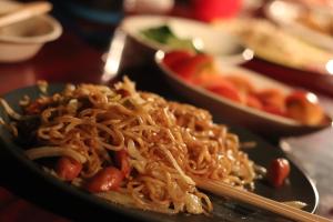 a plate of food with noodles on a table at Minamitsuru-gun - Cottage - Vacation STAY 96482v in Yamanakako