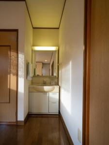 a bathroom with a sink and a mirror at MOCHA House - Vacation STAY 12999 in Nasu-yumoto