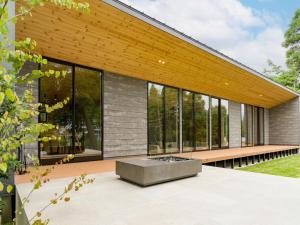 a glass house with a fountain in front of it at Rakuten STAY VILLA Aso Kurokawa -102 1LDK Capacity of 6 persons in Minamioguni
