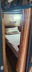 Postel nebo postele na pokoji v ubytování Shri mohan dham dormitory + 12 fotografií