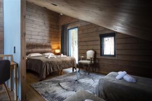Postel nebo postele na pokoji v ubytování Stay North - Levi West Chalet B