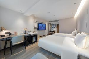 TV/trung tâm giải trí tại Atour Hotel Xiamen SM Plaza Taiwan Street