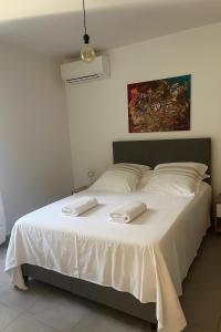 Postel nebo postele na pokoji v ubytování Résidence Arborea C3 Corte