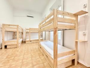 Postel nebo postele na pokoji v ubytování La Merced Nomada & Boutique Hostel