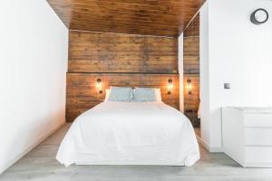 Ένα ή περισσότερα κρεβάτια σε δωμάτιο στο Vivelorural house close to Vegueta with wifi