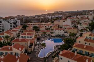 a view of a city at sunset at GF Isabel in Adeje