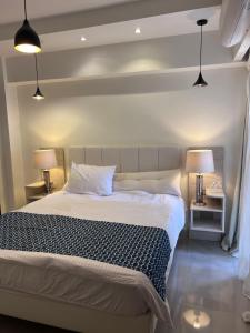 Ένα ή περισσότερα κρεβάτια σε δωμάτιο στο Within the premises of Prime Residence New Alamein